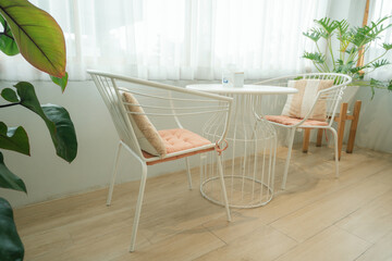 Decorated tables and chairs in a cafe