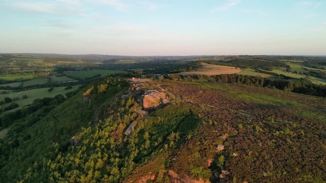 The stunning spiritual Cloud at Bosely on a full moon weekend at sunset, Staffordshire UK - drone anti-clockwise rotate from far and move in