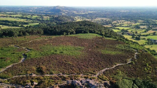 The stunning spiritual Cloud at Bosely on a full moon weekend during golden hour, Staffordshire UK - drone flyover