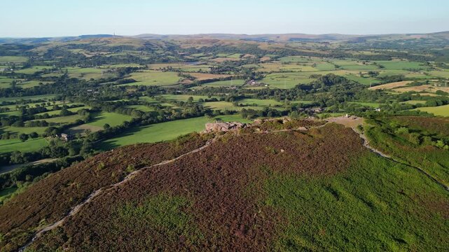 The stunning Cloud at Bosely on a full moon weekend during golden hour, Staffordshire UK - drone slow anti-clockwise rotate from near