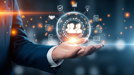 Businessman holding holographic sphere with user icons and network symbols representing human resources, team management and corporate communication. Concept of business networking, leadership and inn - Powered by Adobe