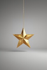 Obraz premium A bold gold hanging star metallic finish metallic finish.