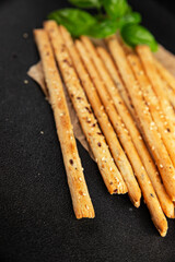 grissotti breadstick Grissini breadsticks whole grain cereal fresh delicious gourmet food background on the table rustic food top view copy space
