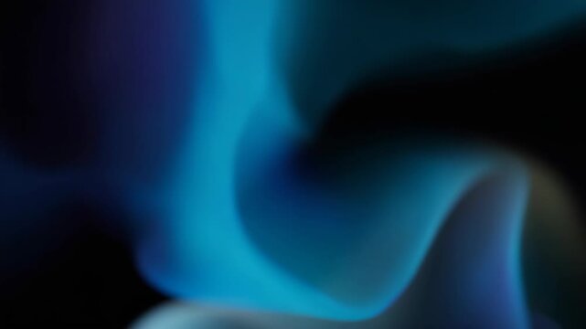 Abstract blue and black smoke swirling fluid motion for digital art