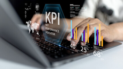 Marketing analyst tracks business progress and growth through key performance indicators (KPI), laptop dashboard system, datum analysis, and database graph technology