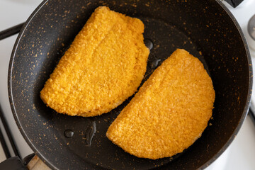 cordon bleu chicken nuggets with salami in close-up