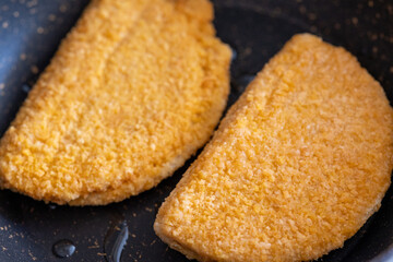 cordon bleu chicken nuggets with salami in close-up