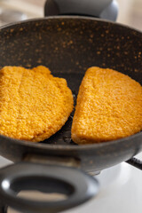 cordon bleu chicken nuggets with salami in close-up