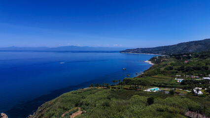 Aerial view of beautiful coastline with turquoise waters near Tropea, Calabria, Southern Italy