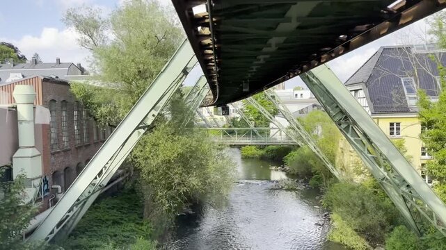 Scenic Ride on the Wuppertal Suspension Railway (Schwebebahn) &ndash; Cabin View of German City Landscape and Urban Transit 