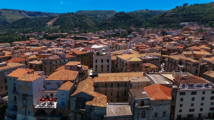 Picturesque cityscape of Tropea in Calabria, Italy, featuring its densely packed traditional...