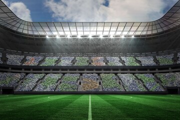 Large football stadium with lights