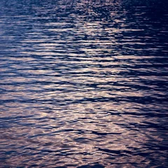 Schilderijen op glas Scenic view of sunlight falling on sea © vectorfusionart