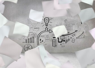 White paper in front of grey wall with graphic