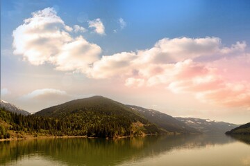 Veiw of cloudy sky over mountain range and river