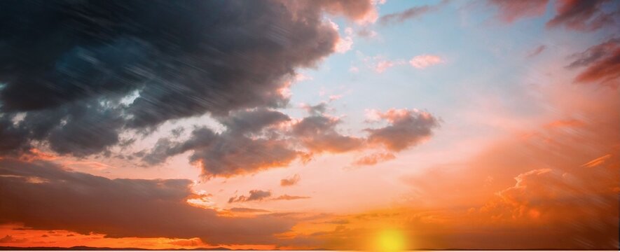 Fototapeta Orange and blue sky with clouds