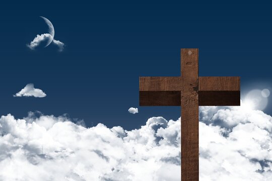 Naklejki Flat design wooden cross is rising above clouds under blue sky, revealing moon and sun glare