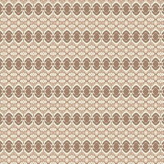 Abstract geometric pattern with symmetrical repeating motifs. Ethnic-inspired design in shades of brown and beige