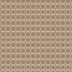 Repeating ornamental pattern in shades of brown and beige. Features symmetrical, stylized floral and geometric elements for a classic look