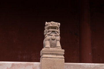 The stone lion sculpture on the guardrail of the Confucian Temple in Deyang, Sichuan Province, China