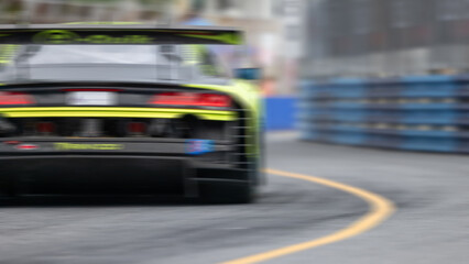 Motion blur race car racing on speed track, Motion blurred super car race on street track circuit, Automobile automotive transportation vehicle background,