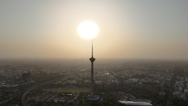 4k Aerial Drone footage of sunset in Pitampura Tv Tower Netaji Subhash Place Metro train Station  in Delhi India