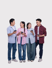 Surprised group of friends looking at something on their phones They appear to be shocked