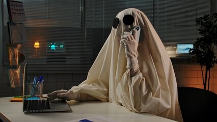 Mysterious Ghost Costume in an Office Setting at Nighttime