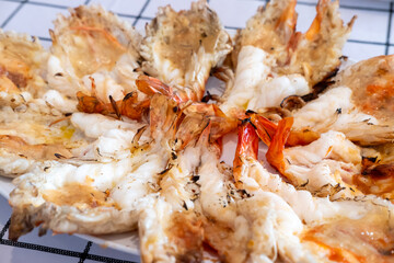 Grilled river prawns served on plate