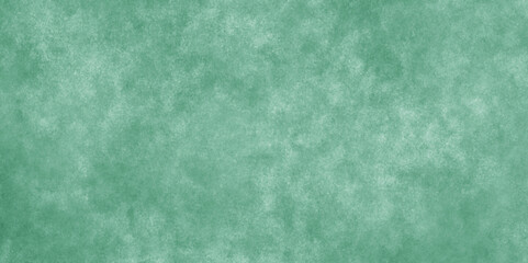 Abstract Elegant dark green background with mottled vintage texture in old fancy background design, texture of colored parchment paper.