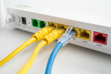 Ethernet cable with wireless router connect to internet service provider internet network.