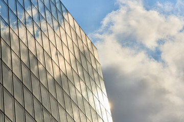 Reflections of the Sky: A Play of Clouds and Sun