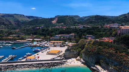 Aerial view of Tropea, a charming town located in Calabria, Italy, showcasing its harbor, beach,...
