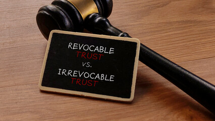 Revocable vs. Irrevocable Trust with Gavel on Wooden Table