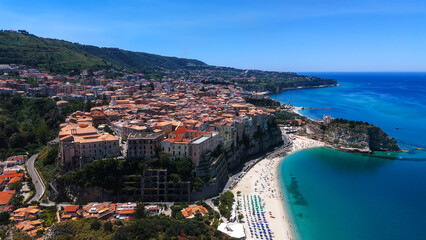 Picturesque Tropea in Calabria, Italy, basking in the summer sun with its turquoise sea, seen from...