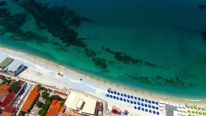 Breathtaking aerial view of Tropea beach, featuring crystal clear turquoise waters, beach...