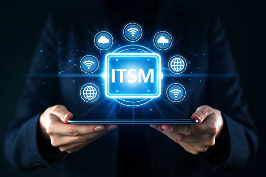 Person holding a tablet displaying the letters itsm representing information technology service management.