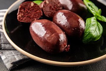 Black pudding sausage fresh delicious gourmet food background on the table rustic food top view...