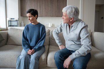 Senior woman enduring verbal aggression from hysterical husband in toxic domestic struggle....
