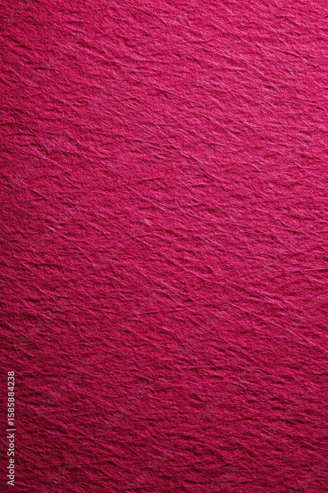 Poster vibrant crimson textured paper with subtle folds, creating a rich and dynamic background surface