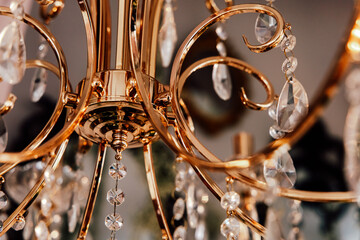 Elegant chandelier adorned with sparkling crystals enhances interior decor and ambiance