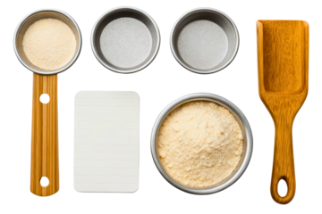 Wooden measuring cup, flour spatula, notepad, and metal measuring bowls isolated with transparent background