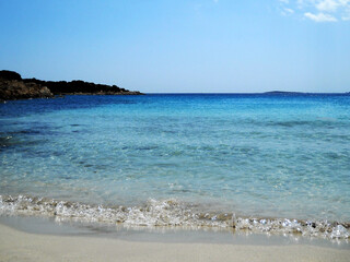 Beautiful Sea View in Olbia, Sardinia. Breathtaking sea view from the coastal city of Olbia in northeastern Sardinia, Italy. The image features crystal-clear turquoise waters, rugged Mediterranean