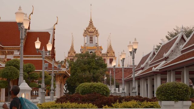 Wat Ratchanatdaram Worawihan temple with footage of its iconic Loha Prasat, intricate spires, and rich architecture Thailand Bangkok 4K