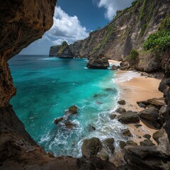 Obraz premium Secluded Tropical Beach with Cliffs and Turquoise Water Under Bright Sky
