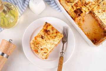 Vegetable healthy diet zucchini lasagna, layered zucchini lasagna stuffing baking with chicken meat, mushrooms and yogurt sauce