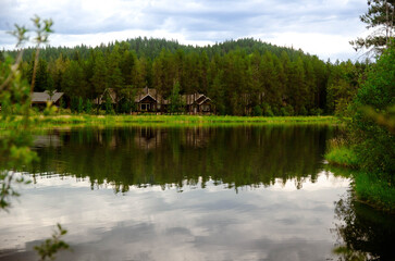 Lakeside house Nestled in Evergreen Forest