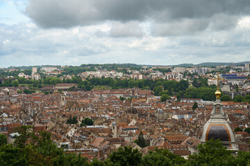 The old town of Besançon is encircled by the Doubs river, as seen from the historic Vauban Citadel. The Cathédrale Saint-Jean de Besançon is visible—perfect for travel, history, and architecture photo