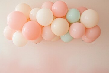 Beautiful balloon garland with pastel colors ideal for birthday party and baby shower decoration
