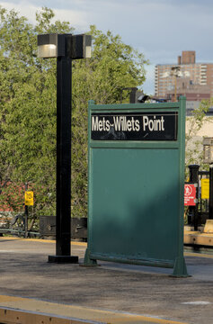 mets-willets point subway station sign on metro stop platform in flushing meadows queens new york city (train railroad travel baseball tennis) park corona